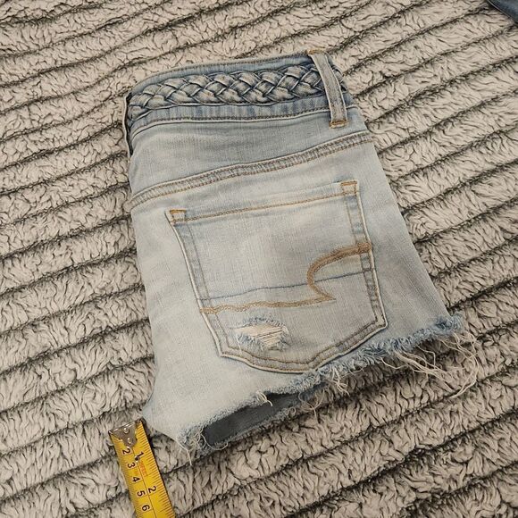 Light wash, exposed button fly American Eagle jean shorts size 6 - Picture 8 of 8